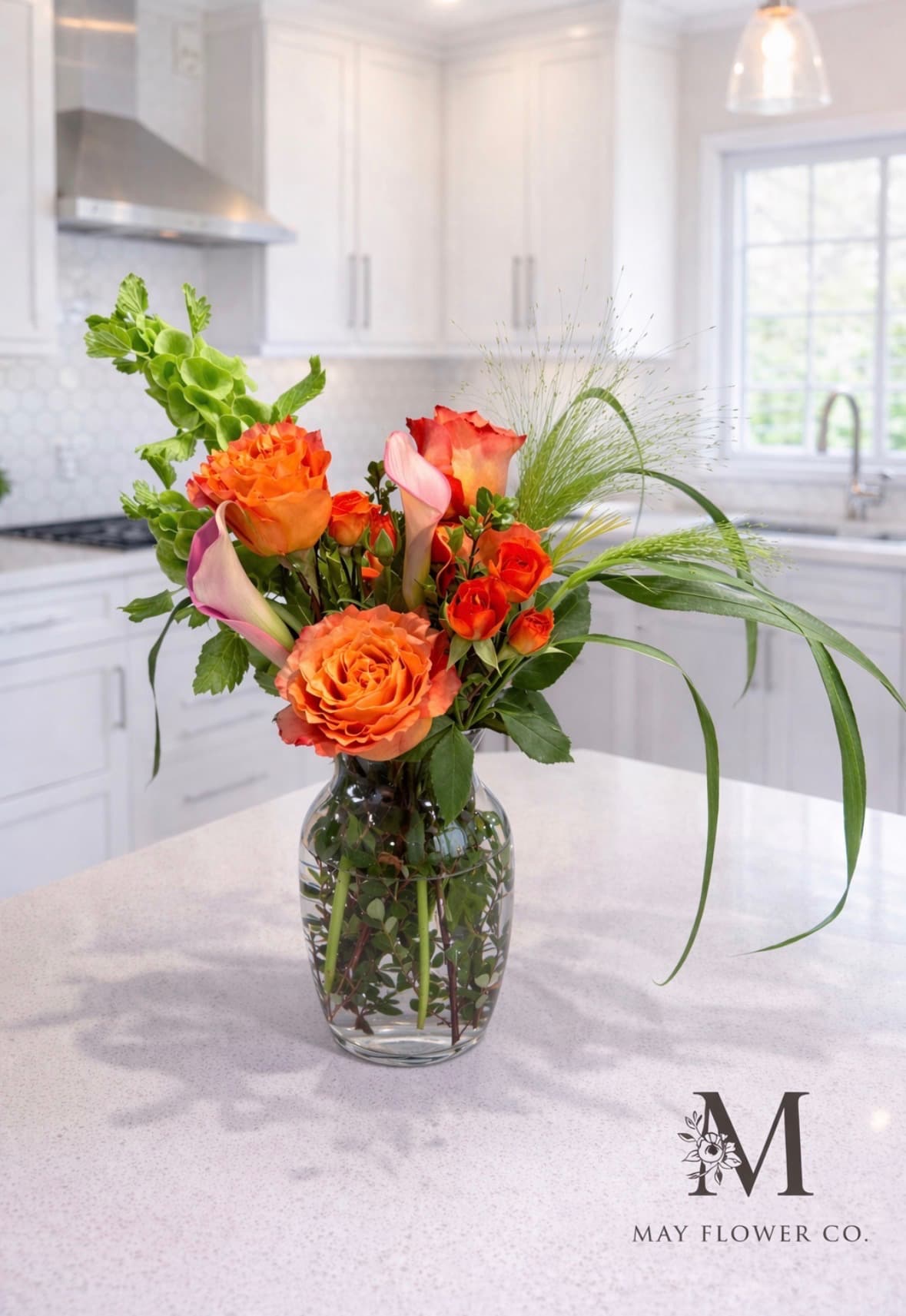 Petite hand-tied arrangement in seasonal blooms